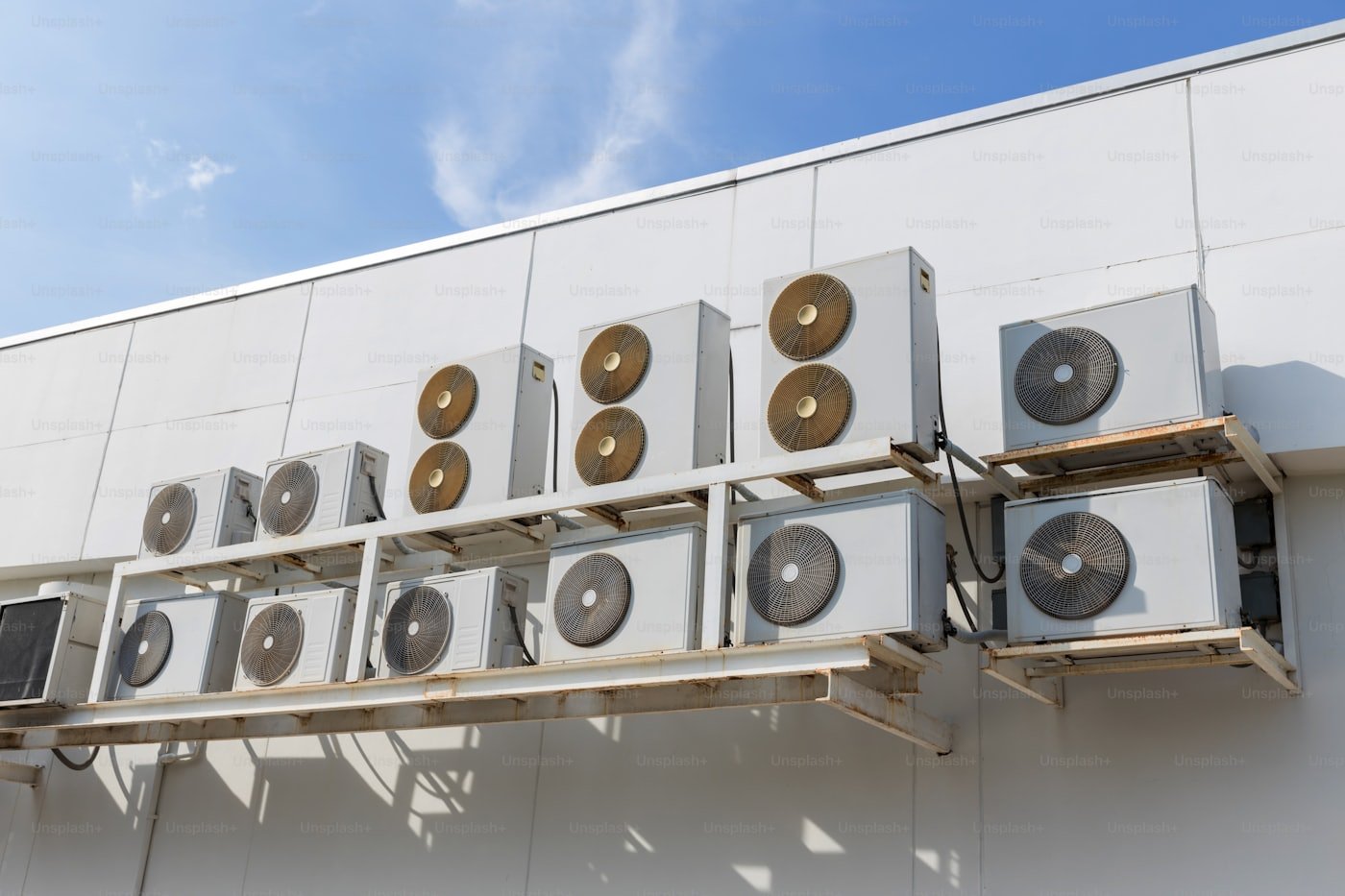 Air conditioning condenser unit being serviced at a home in Meridian, Idaho