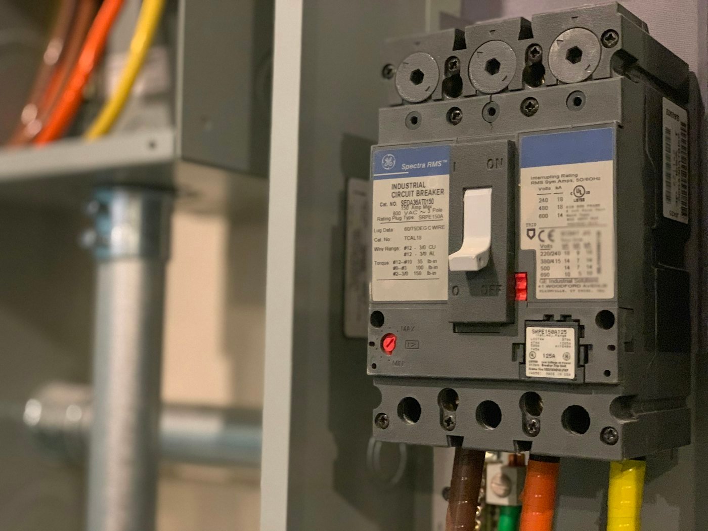 Residential electrical panel interior showing breakers and wiring in Meridian, Idaho