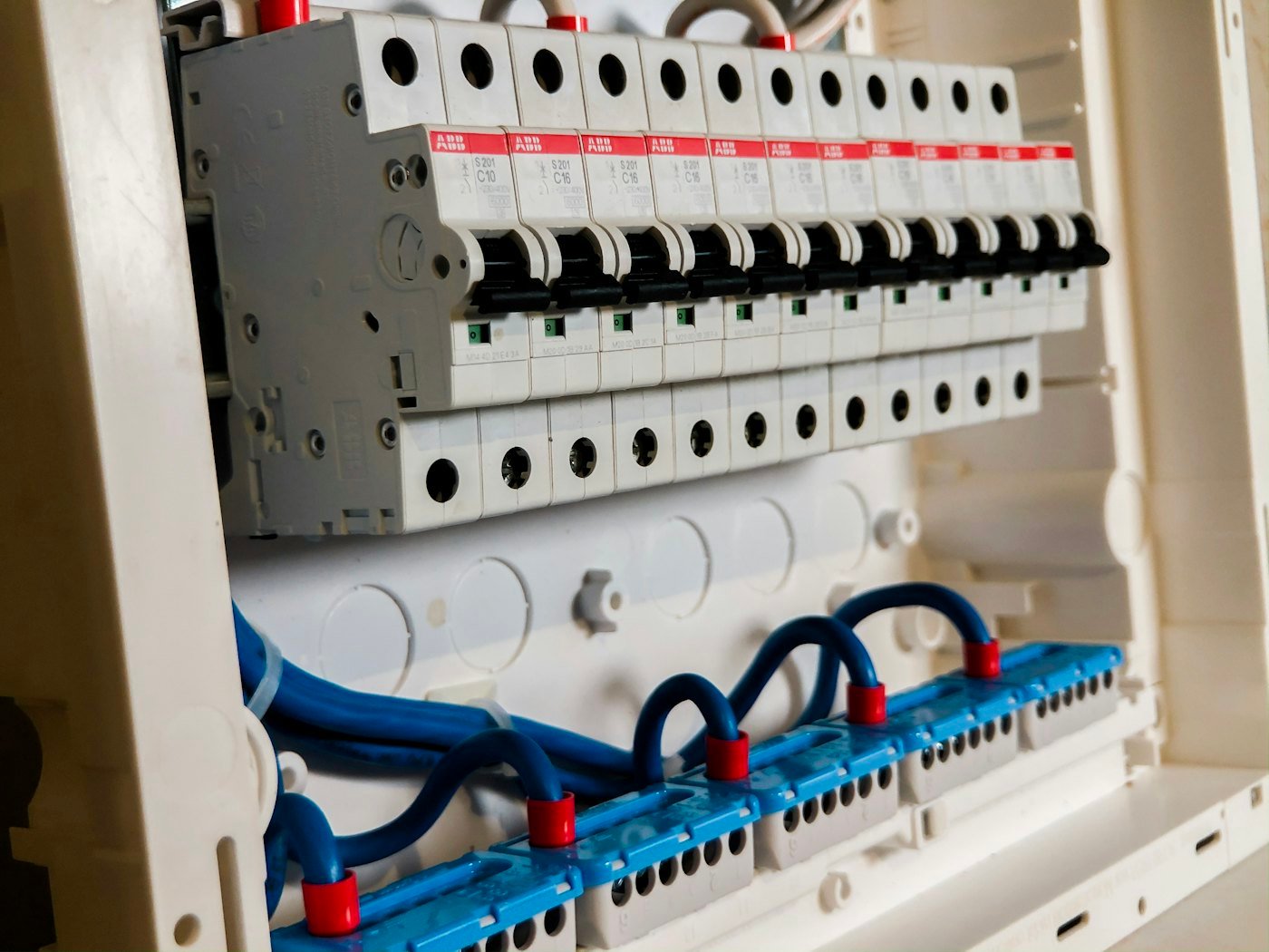 Interior of a residential electrical panel showing breakers and bus bars in Meridian, Idaho