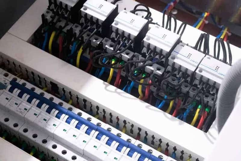 Electrician installing a new 200 amp breaker panel in a Meridian, Idaho home
