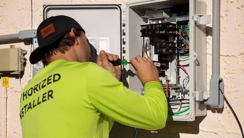 Electrician testing circuits and protection devices after completing work in Meridian, Idaho