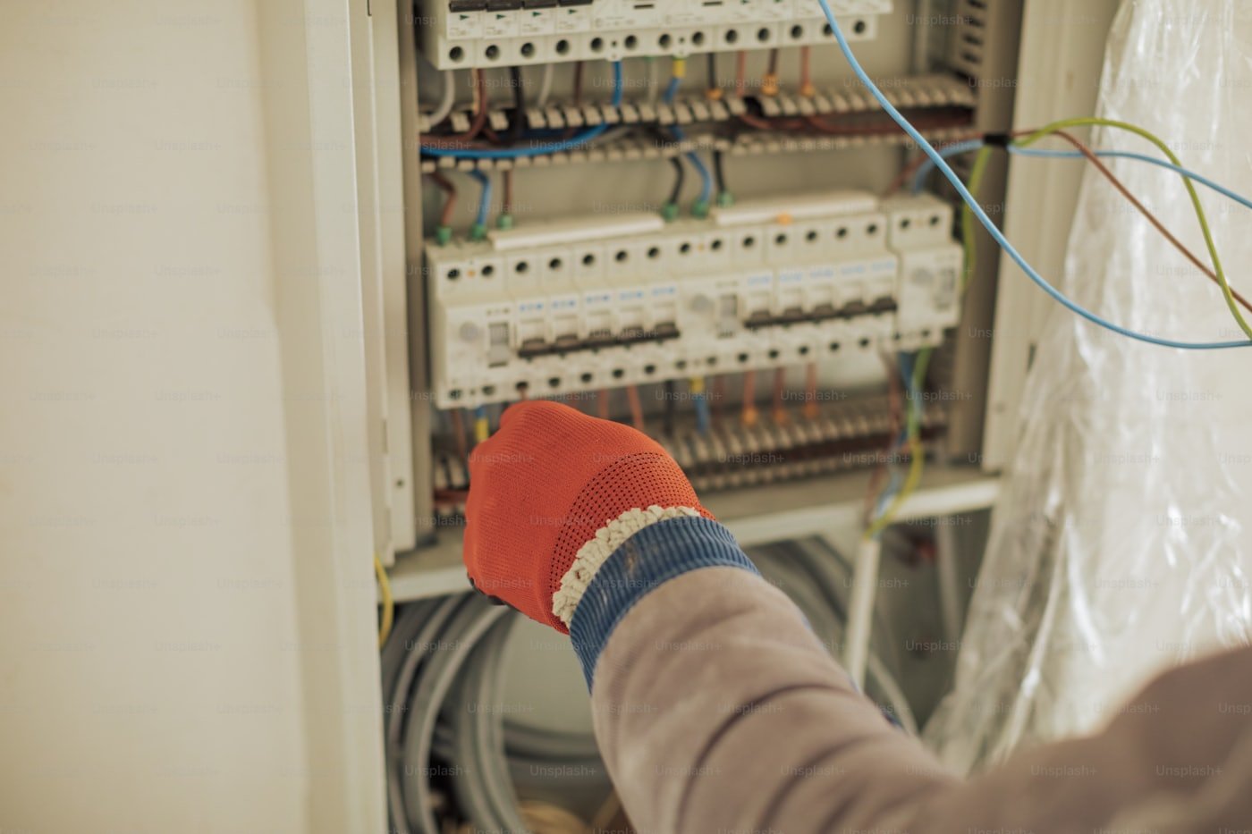 Electrician testing outlets and circuits in a Meridian, Idaho house