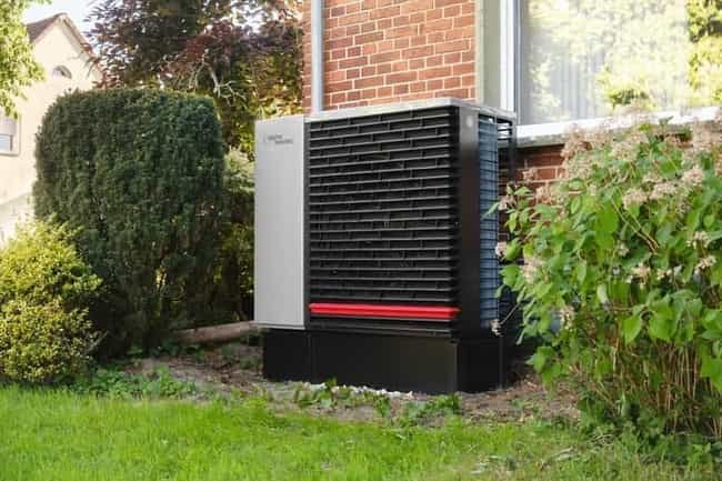 Heat pump outdoor unit running a defrost cycle in cold weather in Meridian, Idaho