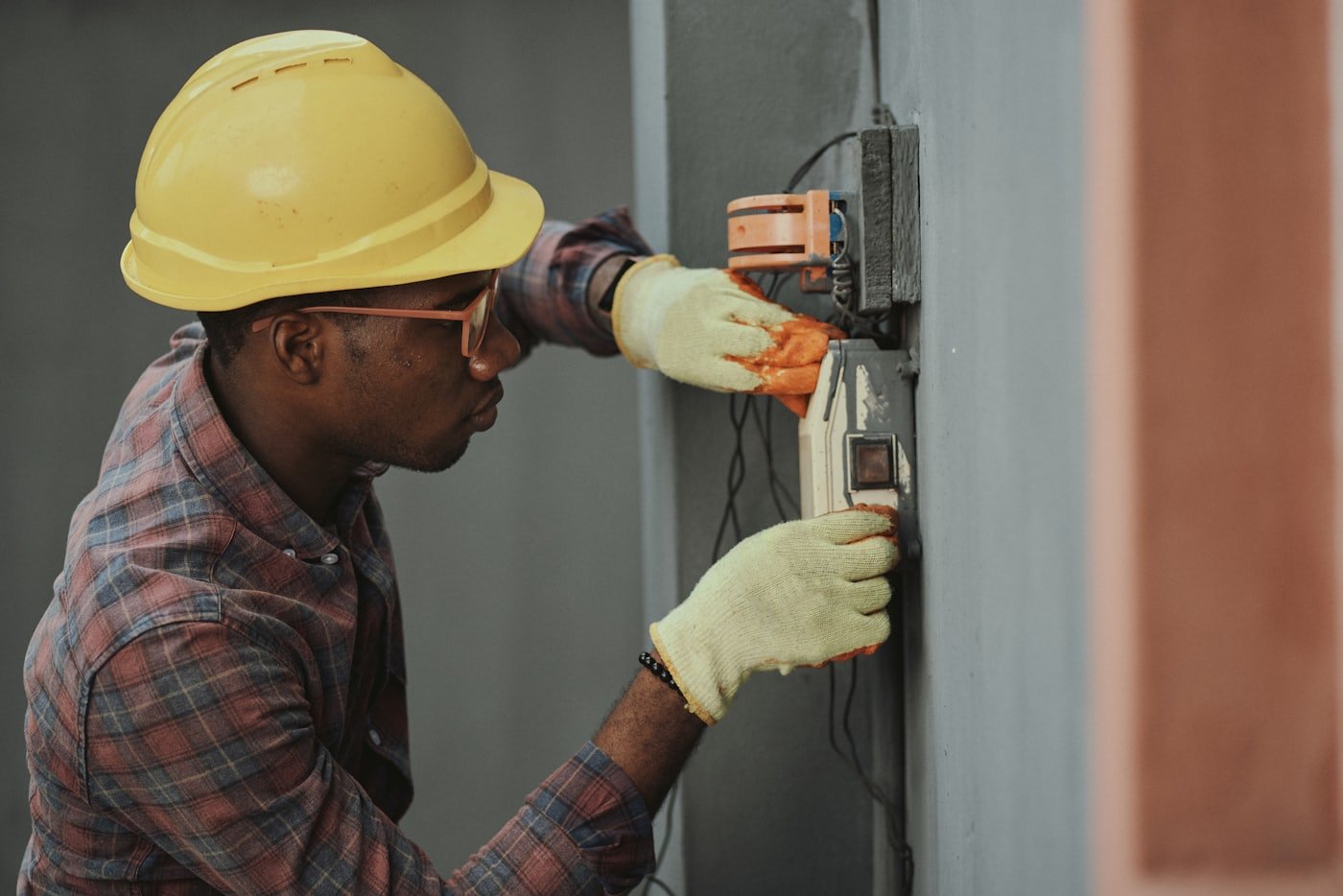 Technician inspecting a furnace heat exchanger during a heating service in Meridian, Idaho