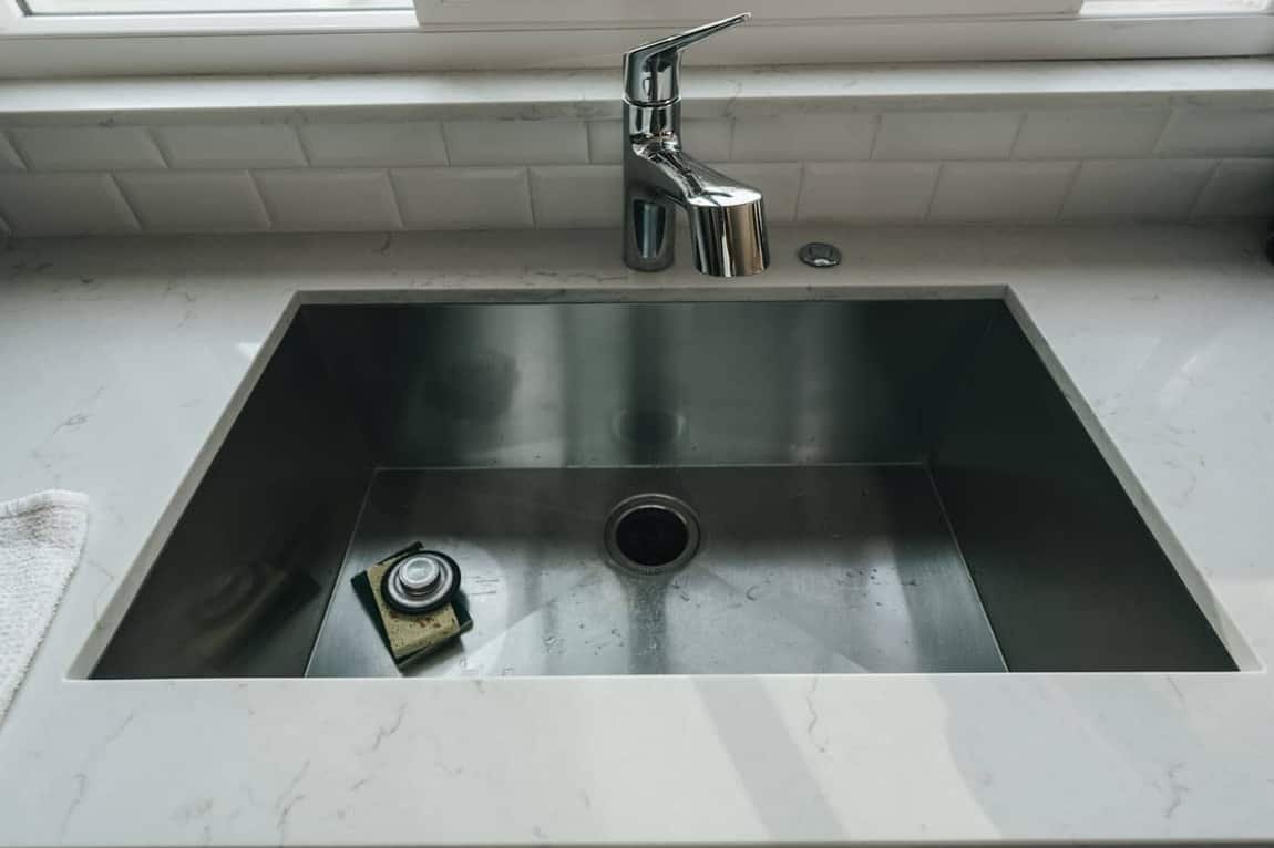 Finished kitchen sink and faucet after plumbing repair in a Treasure Valley home