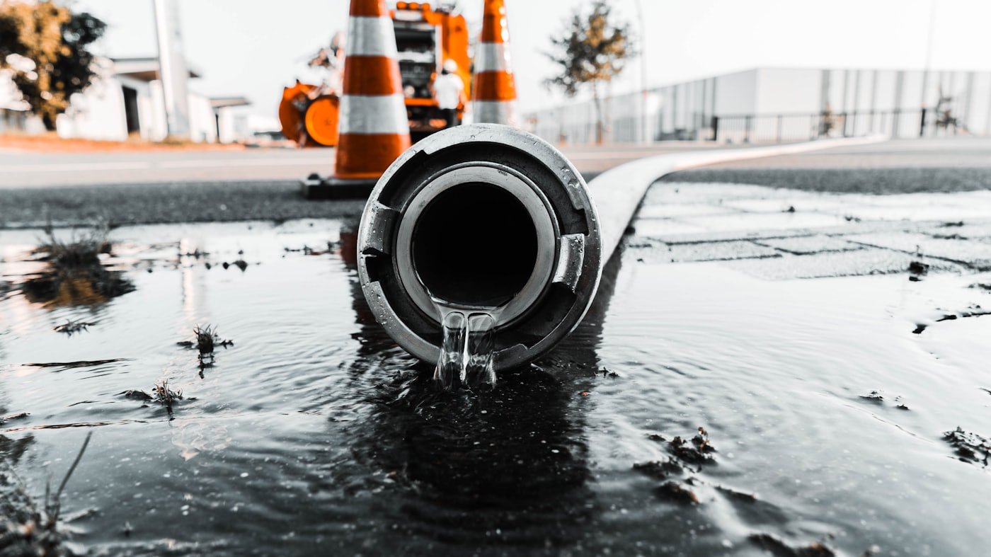 Technician using acoustic leak detection equipment to locate a hidden water leak in Meridian, Idaho