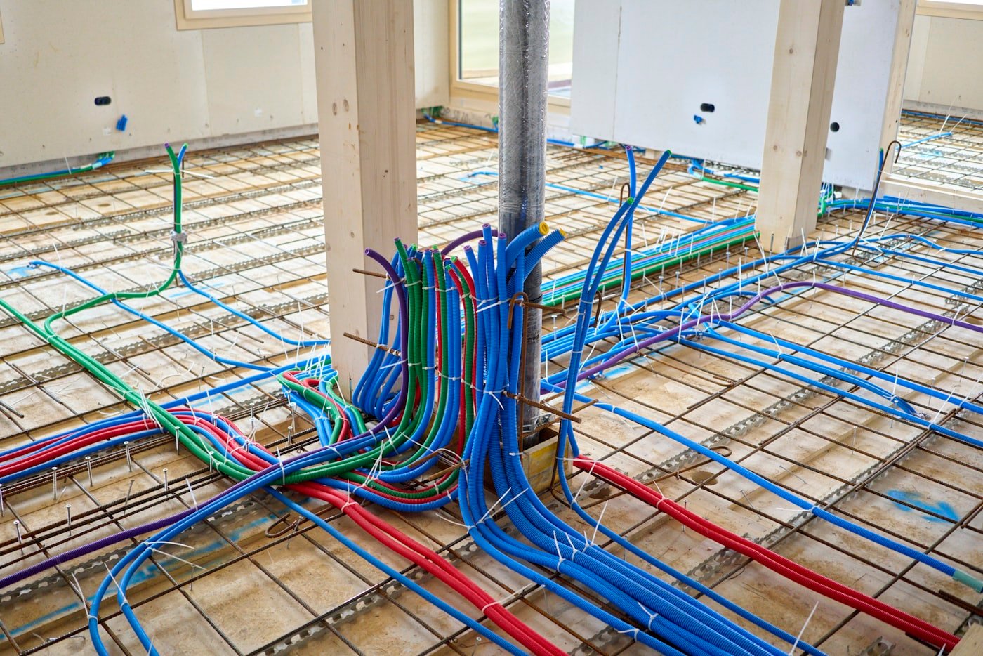 Hydronic radiant heating manifold serving floor loops in an Eagle, Idaho custom home