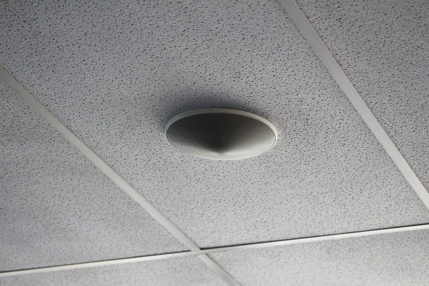 Smoke alarm being replaced on a ceiling in a Meridian, Idaho home