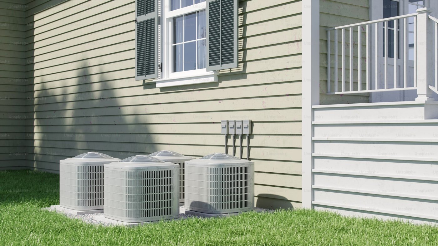 Water softener system installed next to a water heater in a Meridian, Idaho garage